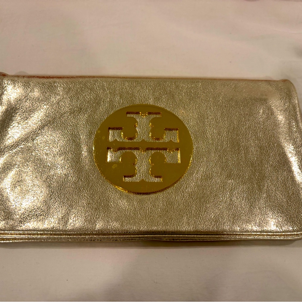 Tory Burch Reva clutch in gold with strap and dust bag, barely used